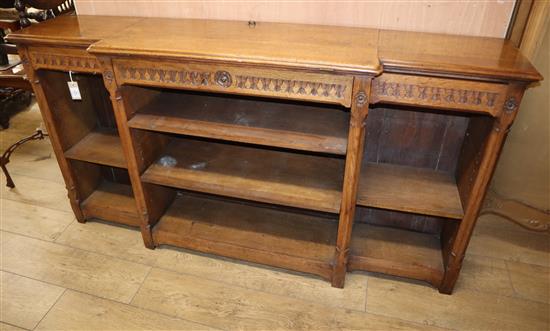 An oak open breakfront bookcase W.174cm